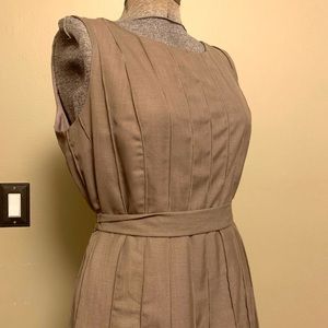 Sleeveless taupe CK dress with piped vertical seams